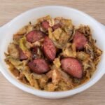 Creamy cabbage and kielbasa with golden cabbage, browned sausage, and a rich mustard cream sauce