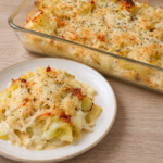 keto cabbage gratin topped with golden, melted Asiago and Parmesan cheese.