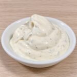 Creamy homemade keto ranch dressing in a serving bowl.