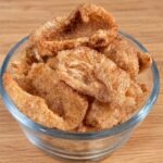 Keto cinnamon toast pork rinds coated in sweet cinnamon seasoning