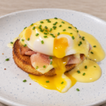 Keto Prosciutto Eggs Benedict with poached eggs, prosciutto, and creamy hollandaise sauce